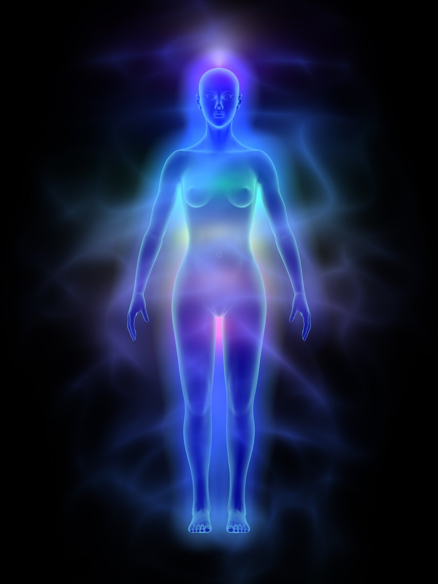 Human energy body (aura) with chakras - woman